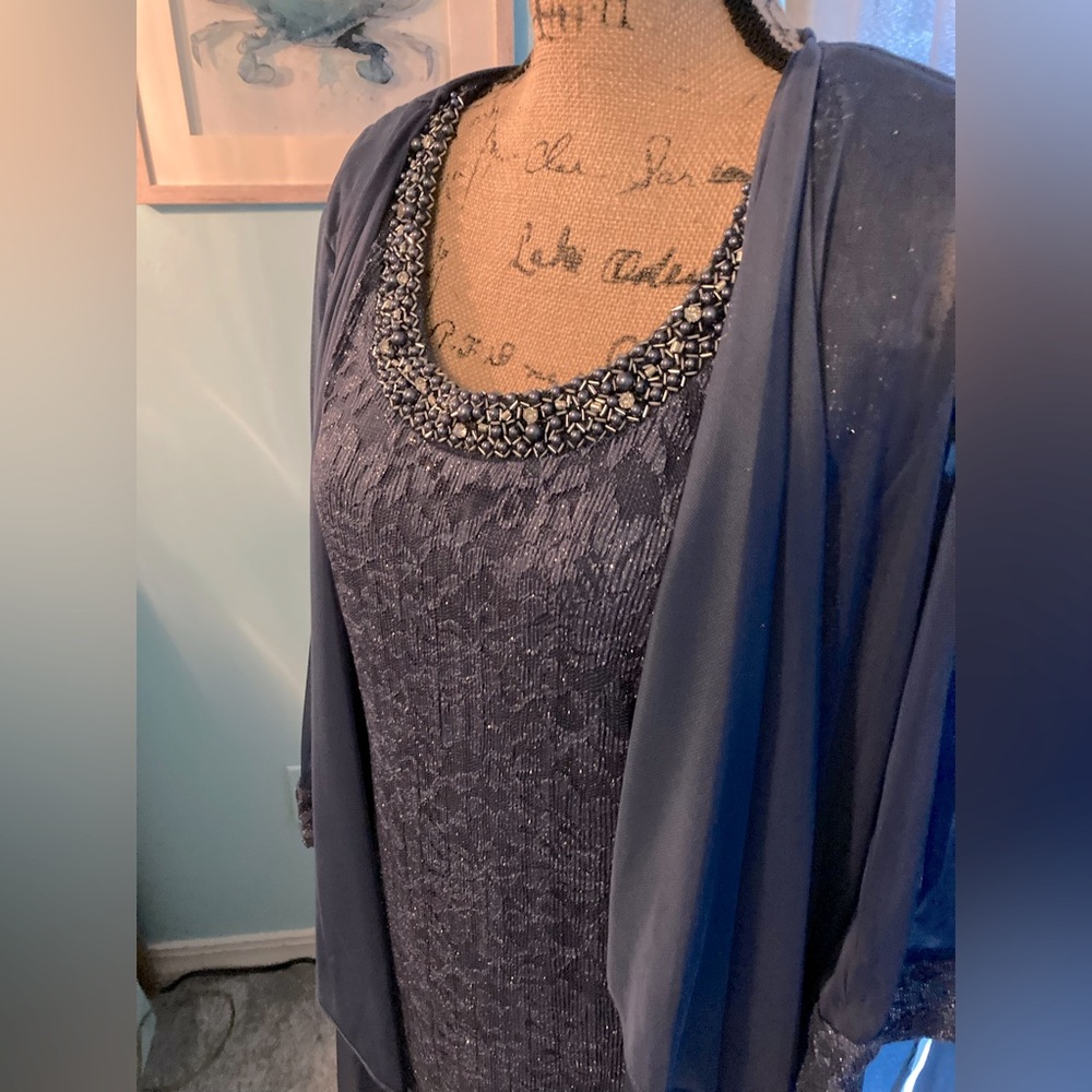 Beautiful blue formal dress with beadwork and sparkle.